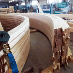 Grinzi lamelare curbate